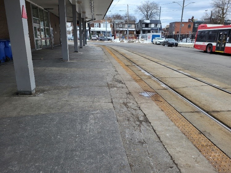 image of customer platform at Main Street Station with TTC bus in background