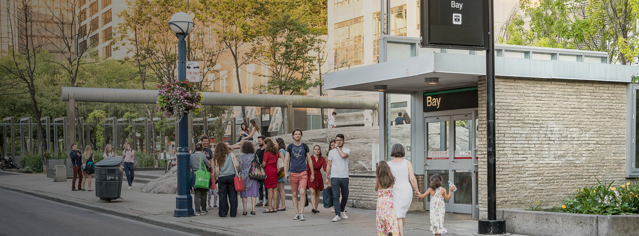 Pedestrian in front of Bay Station Entrance