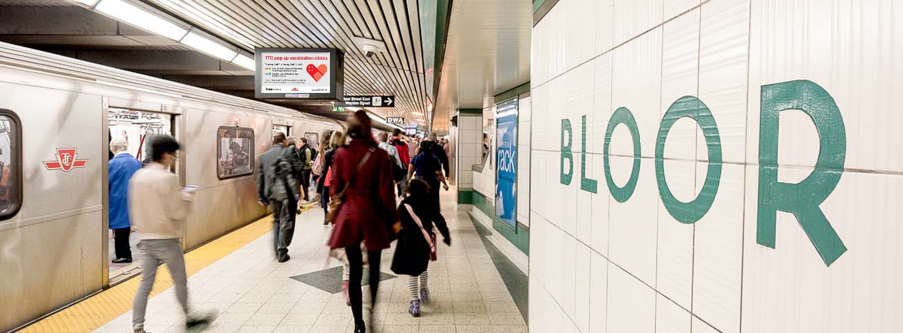Subway Passengers boarding and unboarding Train at Bloor and Yonge Station