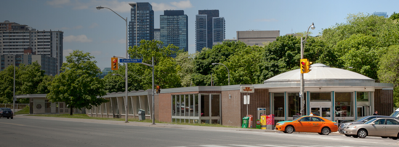 parking area with some vehicles parked near Castle Frank Station Entrance