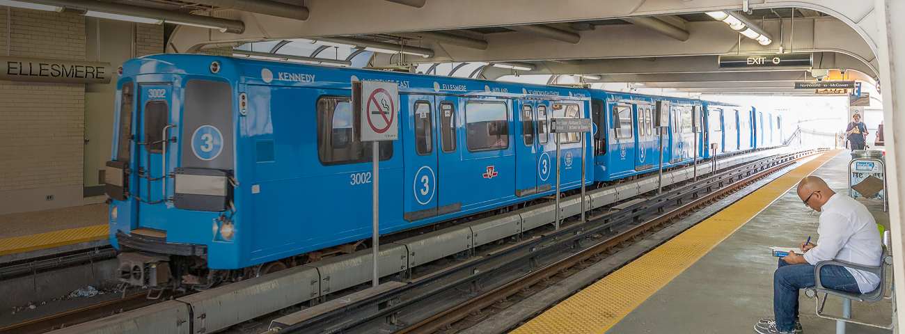 Passengers waiting for Scarborough Rapid Transit at Ellesmere Station