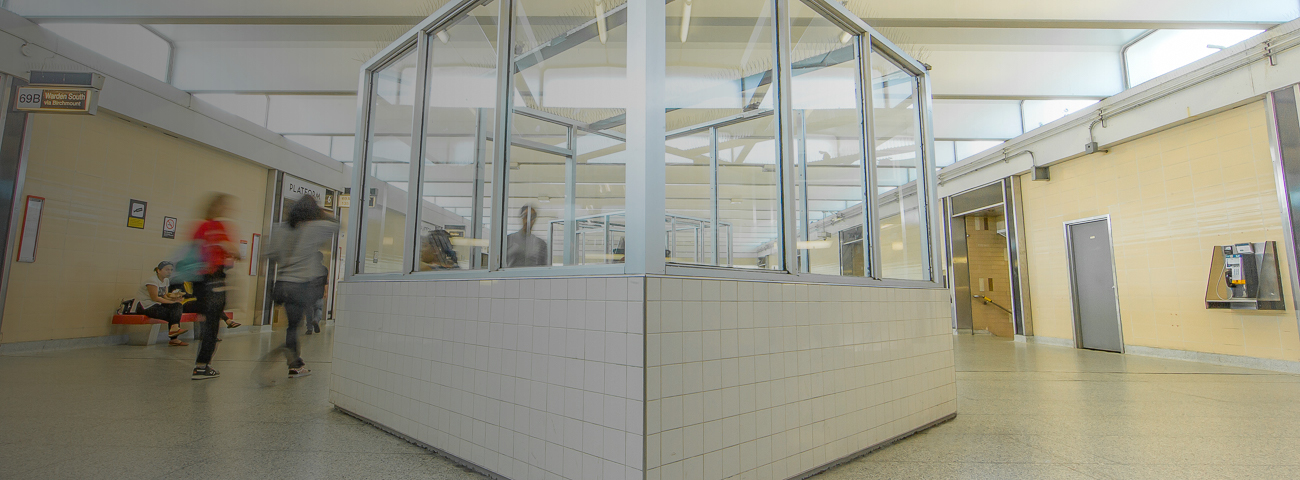 Passengers near waiting area at Warden Station
